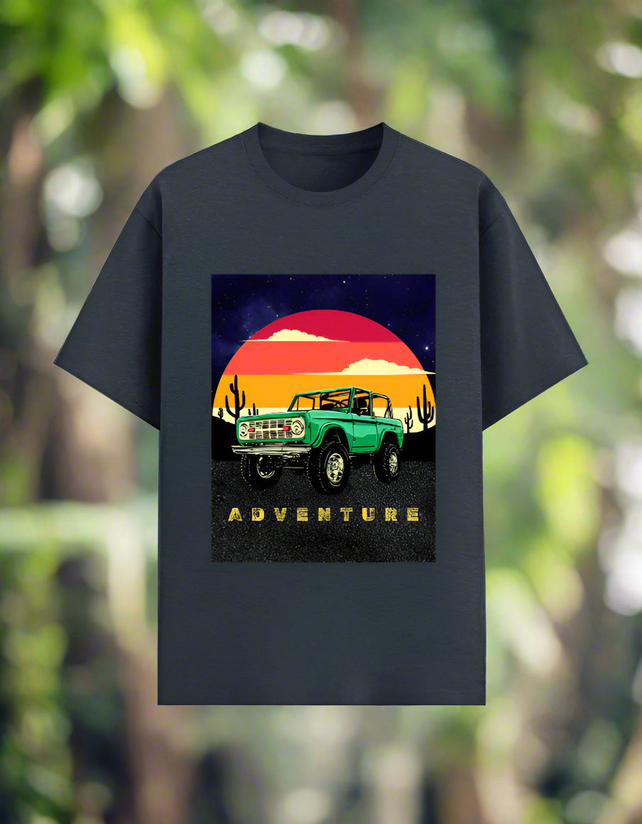 Men’s Adventure T‑shirt with retro desert sunset and green off‑road 4x4 graphic, front view, poly‑cotton 180 GSM. Royal Blue