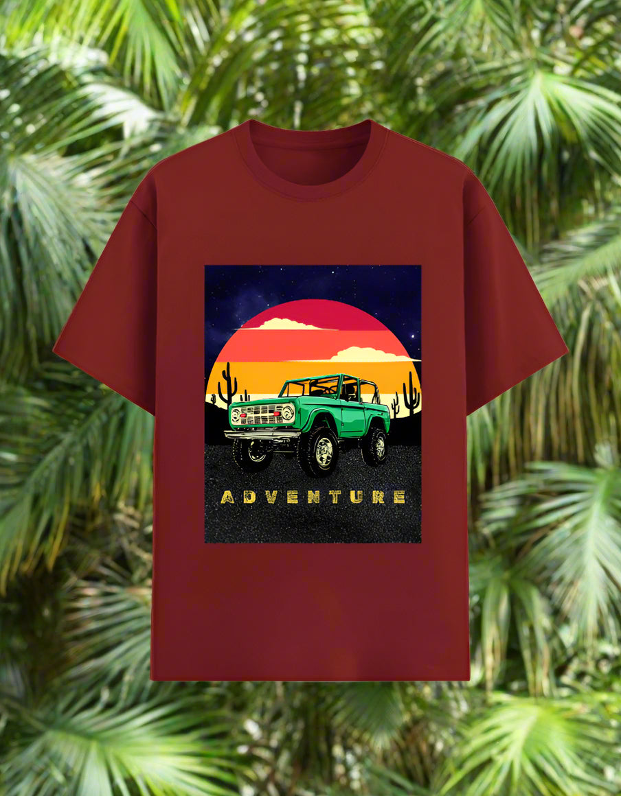 Men’s Adventure T‑shirt with retro desert sunset and green off‑road 4x4 graphic, front view, poly‑cotton 180 GSM. Red